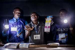 Election officials began counting and collating ballots on Monday in a climate of deep suspicion about fraud.  By Luis TATO (AFP)