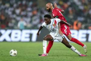 Equatorial Guinea captain Emilio Nsue (R) was barred from 2026 World Cup qualifying, then reinstated..  By FRANCK FIFE (AFP)