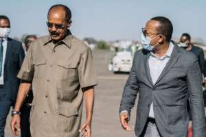 Ethiopian Prime Minister Abiy Ahmed, right, and Eritrean President Isaias Afwerki, meeting at Asmara Airport on March 25.  By Aron Simeneh (Office of the Prime Minister Ethiopia/AFP)