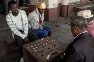 Fanorona is an extended version of Western draughts or Go, popular in the Far East, using a rectangular board marked with lines and intersections in which each player starts with 22 pieces.  By RIJASOLO (AFP)