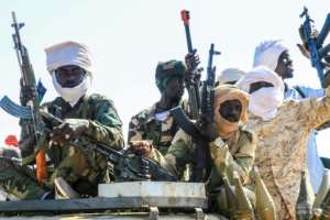 Fighters of the Sudan Liberation Movement, a Sudanese rebel group active in Sudans Darfur State which supports the army.  By - (AFP)