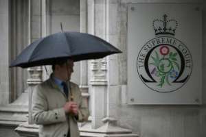 Five judges at the UK Supreme Court ruled that the deportation scheme was unlawful.  By JUSTIN TALLIS (AFP)