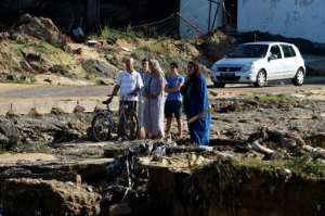 Flash floods on Saturday in Tunisias northeastern Cap Bon peninsula collapsed bridges and damaged infrastructure.  By FETHI BELAID (AFP)