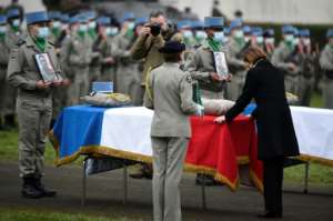 French losses: Defence Minister Florence Parly pays tribute to three soldiers killed by a roadside bomb in Mali in December.  By JEAN-CHRISTOPHE VERHAEGEN (AFP)