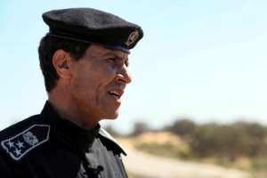 General Fawzi Abugualia, spokesman for the Agriculture Police, says the green belt has become the target of numerous violations.  By Mahmud Turkia (AFP)