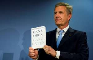 German former president Christian Wulff presents his book Ganz Oben, Ganz Unten (Way Up, Way Down) in Berlin in June 2014. Wulff stood down in 2012, but was later cleared of wrongdoing