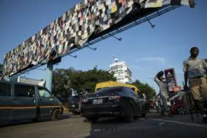 Ghana receives an estimated 15 million second-hand garments each week.  By CLAUDIA LACAVE (AFP)
