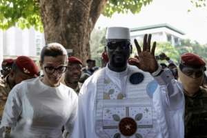 Guinean President Mamady Doumbouya and his wife before voting in Conakry in December 2025, in an election in which all major opponents were barred.  By Patrick MEINHARDT (AFP/File)