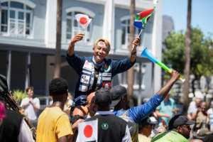 Gump Suzuki (C) started his journey from Kenya to South Africa in July 2024.  By RODGER BOSCH (AFP)