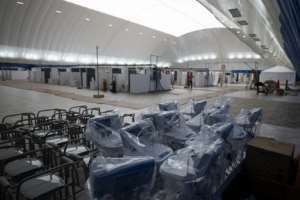 Hard-hit New York set up makeshift hospitals, even as officials said the peak of deaths and infections may be near.  By Johannes EISELE (AFP)