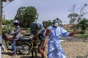 Health workers battle with few resources to treat patients in Ebola-hit eastern DR Congo.  By Glody MURHABAZI (AFP)