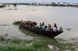Heavy flooding has affected and displaced about 426,000 people in South Sudan, such as these pictured September 14, 2021, including 185,000 children, as overflowing rivers deluged homes and farms in the impoverished country.  By ASHRAF SHAZLY (AFP/File)