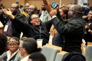Hichilema supporters celebrated after election results showed he had won a second term.  By GIANLUIGI GUERCIA (AFP)
