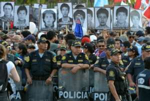 Hundreds of people gather in Lima in January 2018 to protest at a presidential pardon granted former leader Alberto Fujimori, convicted in 2009 of embezzlement and human rights abuses including murder