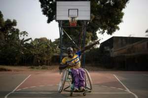 Idriss Feissal invented a model of pedal tricycle especially adapted for handicapped people.  By FLORENT VERGNES (AFP)