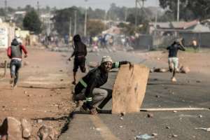 In Ennerdale on the outskirts of Johannesburgs sprawling Soweto township, outraged locals have burnt tyres and attacked police over the acute lack of employment, shortages of electricity and water