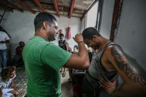 In the 1990s, after the collapse of the Soviet Union, Cuba changed from an atheist to a secular state, and the ruling Communist Party party started admitting believers in its ranks.  By ADALBERTO ROQUE (AFP)