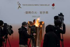 International Olympic Committee president Thomas Bach said postponing the 2020 Games was an option but that cancellation was not on the agenda.  By Philip FONG (AFP)
