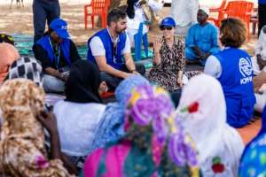 IOM Deputy Director General SungAh Lee spoke with Chadian returnees in Adre.  By Joris Bolomey (AFP)