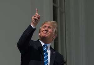 It is important not to look directly at a solar eclipse, as Trump did in 2017.  By NICHOLAS KAMM (AFP/File)