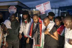 Kenyan activist Boniface Mwangi says he was detained and tortured alongside Atuhaire.  By Tony KARUMBA (AFP)