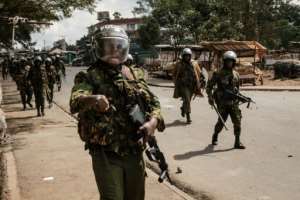 Kenyan riot police were out in force.  By YASUYOSHI CHIBA (AFP)
