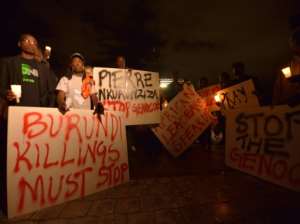 Kenyans and Burundians living in Kenya hold a vigil in Nairobi in December 2015 to demand an end to the crackdown.  By TONY KARUMBA (AFP)