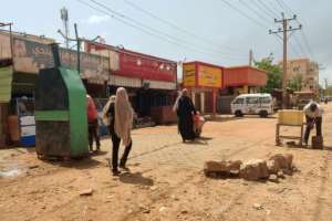 Khartoum residents unable to leave have been forced to camp out for weeks as supplies of vital goods run low.  By - (AFP)