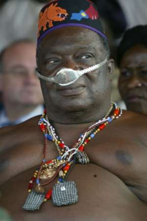 King Dah Dedjalagni Agoli-Agbo, a police officer by training had 41 wives.  By PIUS UTOMI EKPEI (AFP/File)