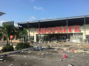 Lagaos protests have descended into looting in some parts of the city.  By Sophie BOUILLON (AFP)