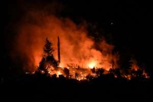 Late on Sunday, a fire broke out in an abandoned part of the Vathy camp -- though the ministry said nobody was hurt.  By LOUISA GOULIAMAKI (AFP)