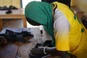 Learning to sew helps ex-child soldiers move on from the violence they have suffered.  By Mariam KONE (AFP)