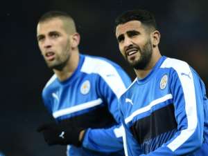 Leicester Citys Islam Slimani (L) and Riyad Mahrez warm up ahead of an UEFA Champions League match at the King Power Stadium in Leicester, in October 2016