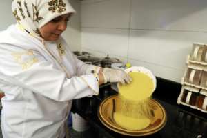 Libyan chef Monira Zwait says cooking couscous is a tradition that requires strict adherence to age-old recipes, which she calls a red line.  By Mahmud Turkia (AFP)