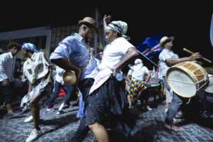 Local participants stressed the importance of keeping old local traditions alive.  By QUEILA FERNANDES (AFP)