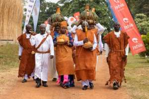 Local people brought gifts and wine in calabash pots to express their allegiance to the monarch.  By BADRU KATUMBA (AFP)