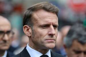 Macron made historical reconciliation a priority but had mixed results.  By Ludovic MARIN (POOL/AFP)