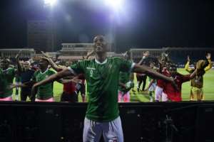 Madagascar celebrate their penalty shootout victory over DR Congo in the last 16.  By JAVIER SORIANO (AFP/File)