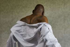 Madhuku says he was beaten by police-backed security agents. The police deny involvement.  By Jekesai NJIKIZANA (AFP)
