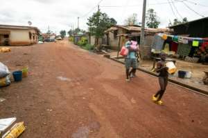 Many residents on the outskirts of Moanda have no running water or mains electricity.  By STEEVE JORDAN (AFP)