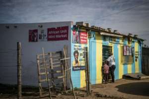 Many small township convenience stores, known as spaza shops, are run by foreign nationals.  By MARCO LONGARI (AFP)