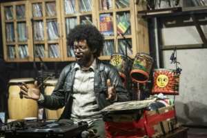 Melaku Belay is the soul of Fendika, a place he discovered 25 years ago, buoyed by a passion and love for dancing and music.  By Amanuel Sileshi (AFP)
