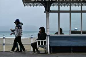 Migrants living on the Bibby Stockholm spend their days in Weymouth, near Portland harbour where the barge is moored.  By Ben STANSALL (AFP)