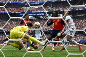 Mikel Merino (in the red shirt) pokes in the goal that secured Spains passage to the World Cup semi-finals.  By Paul ELLIS (AFP)