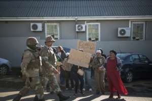 More than 150,000 foreign nationals have left South Africa because of the protests.  By MARCO LONGARI (AFP)
