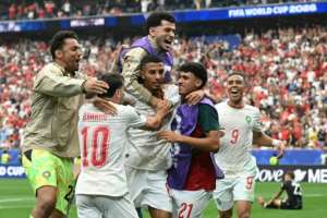 Moroccos Azzedine Ounahi celebrates scoring his second goal in a 3-0 last-16 win over Canada.  By RONALDO SCHEMIDT (AFP)