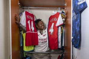 Nana Owiti has millions of followers for her Gunners-obsessed social media feeds.  By Tony KARUMBA (AFP)