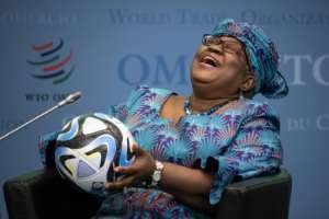 Ngozi Okonjo-Iweala with a 2023 FIFA Womens World Cup official football.  By Fabrice COFFRINI (AFP)