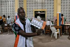 None of the four candidates who faced Ouattara had the backing of a major party. By Sia KAMBOU (AFP)