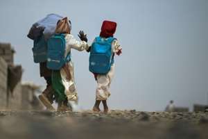 One Sudanese girl lost her right arm to the war. She high-fived with her left hand.  By Khaled DESOUKI (AFP)